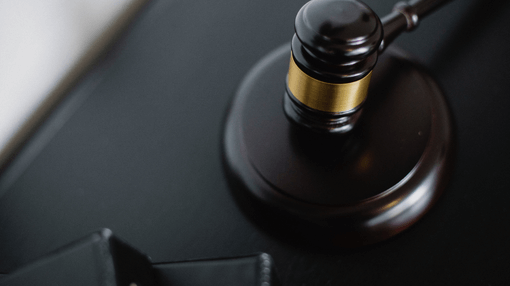 gavel on a black table