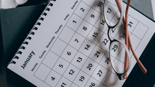 eyeglasses on top calendar